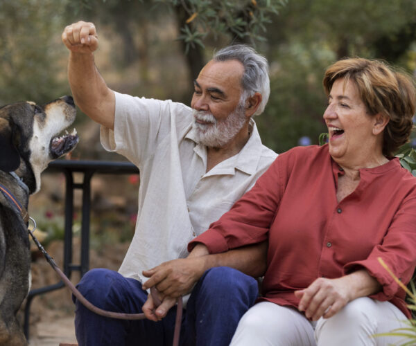 elderly-couple-enjoying-life-home-countryside-with-their-dog #image_title